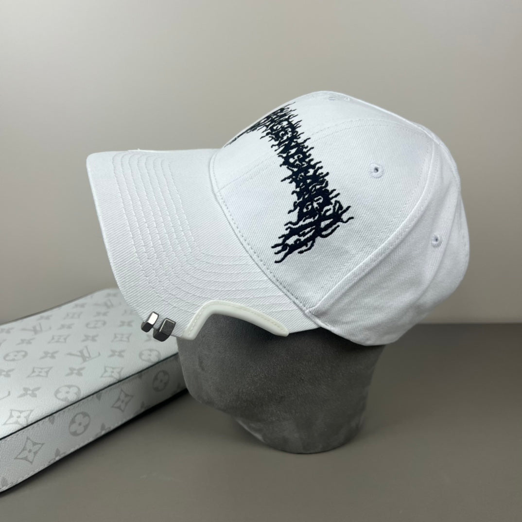 White cotton cap with black graphic embroidery and sculpted brim